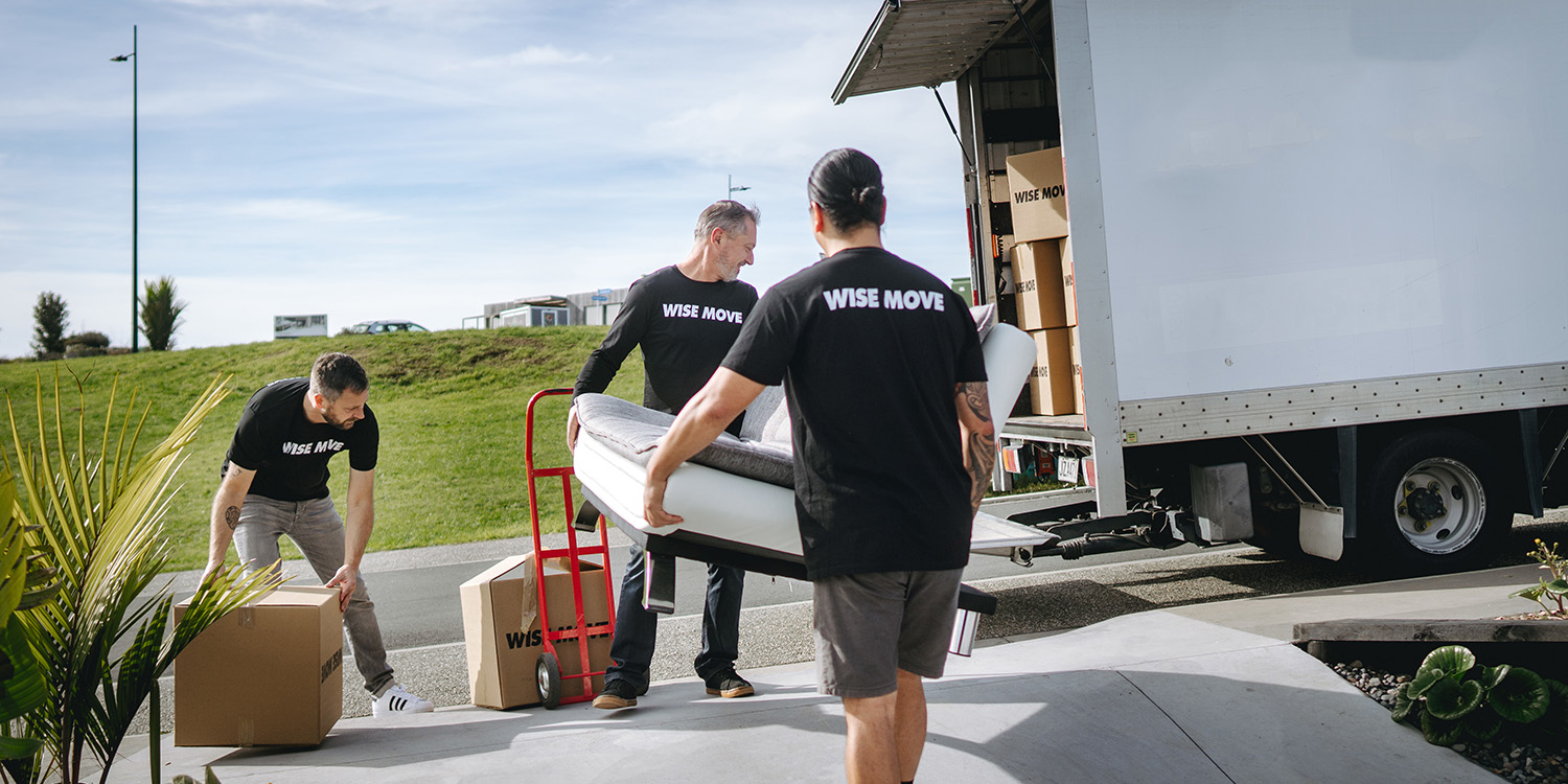 Two movers carrying sofa