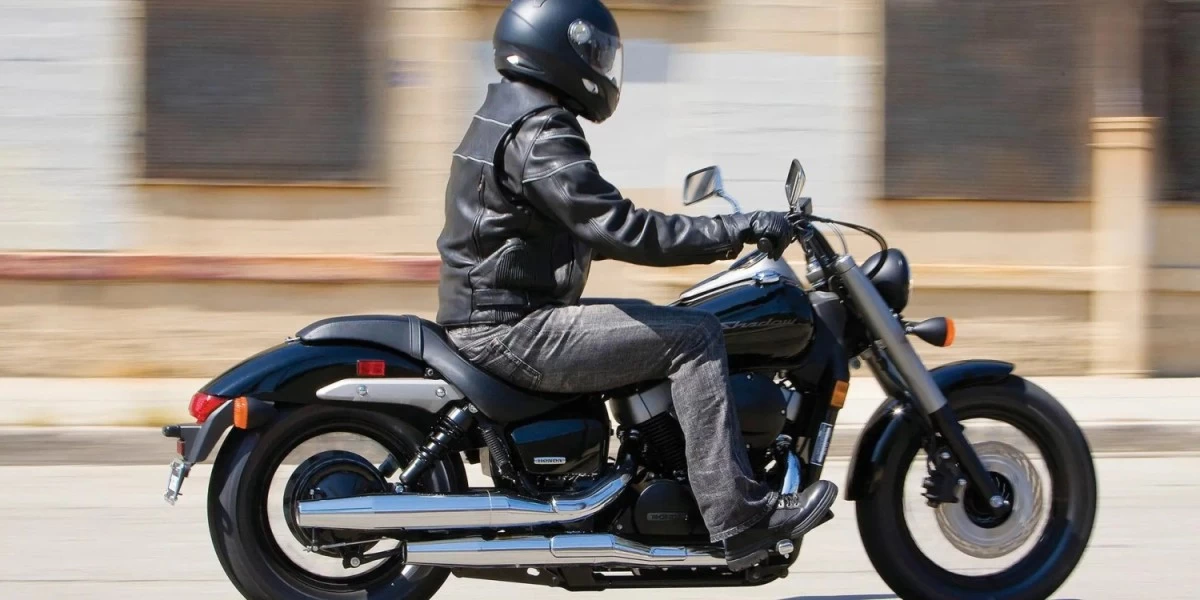 A man riding a Honda Shadow Phantom 