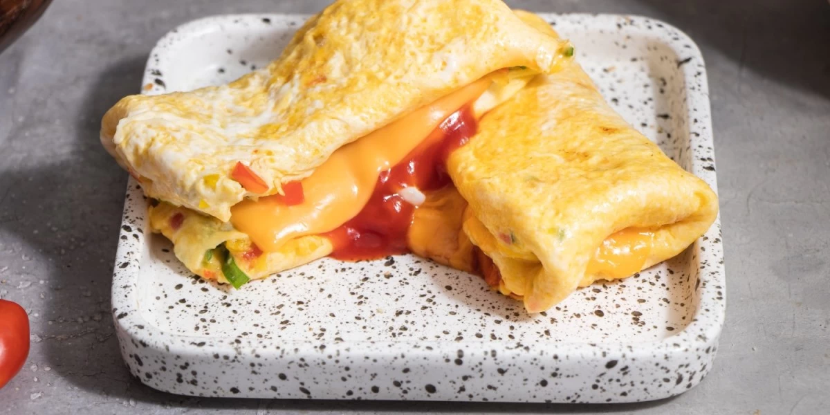 An easy-to-cook cheese omellete, tasty but quick to prepare especially when in such a busy day