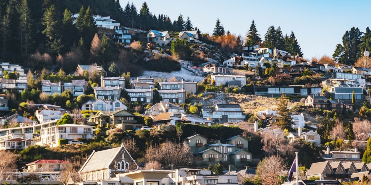 An aerial view of a rental neighbourhood in the picturesque Queenstown, New Zealand, highlighting the growth in residential property