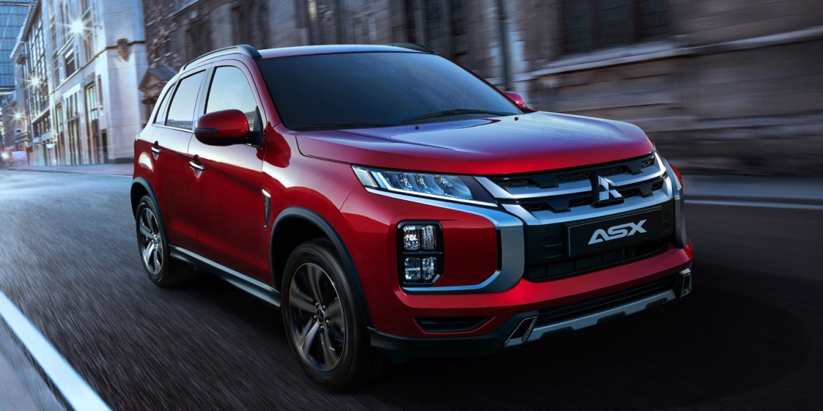 A bright red Mitsubishi ASX,  popular for its style, technology, and versatility making it a favorite of New Zealanders