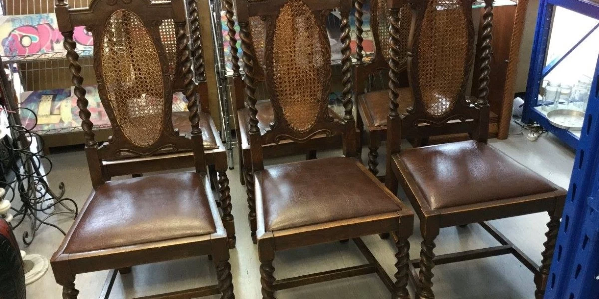 Three vintage wooden chairs with intricate carvings for sale at R & N Trading Post in Greymouth