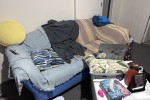 A qeen sized bed, A sofa for two, A desk, A chair, A small dining desk...