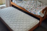 Wooden single bed with trundle and 2 mattresses