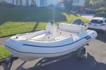 Rigid inflatable boat on trailer