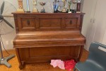 Two upright pianos