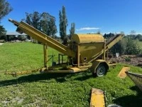 Trailer with ag machinery on it