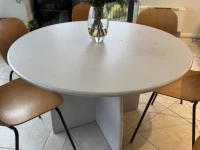 Two double leather sofas and a 120 cm round table