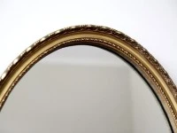 Oval gilt style vintage mirror