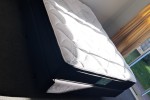 A queen bed, Three seater couch, a recliner chair, washing machine, 77...
