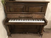 Upright piano, has little wheels