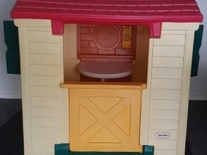 Plastic Little Tikes Playhouse in sections