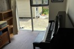 Upright piano light piano, King single bed, Dining table with 4 chairs...