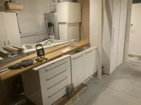 A group of kitchen cabinets stored in my garage to another property 3k...