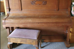 Antique upright piano appears an upright grand. Brand is not visible ...