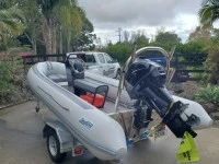 Inflatable boat on trailer.