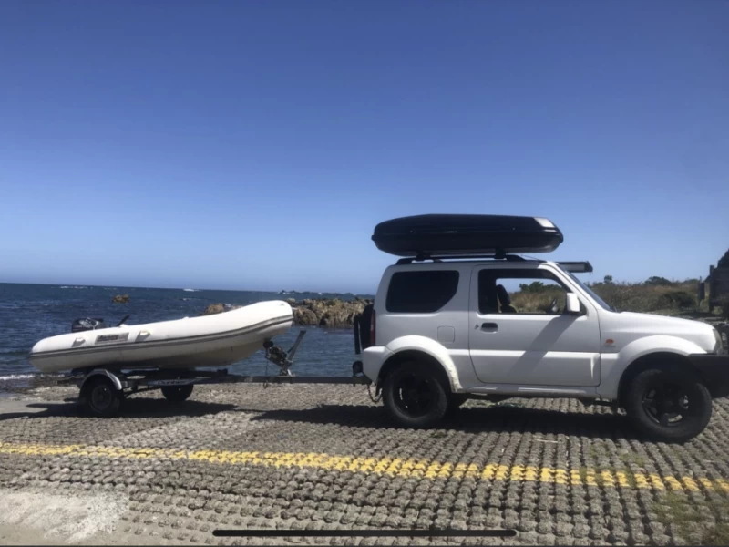 Inflatable boat 3.5m inflatable on a standard trailer.