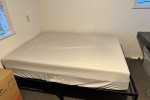 Double matress and metal frame, 3 medium size boxes, 1 small box, 1 la...