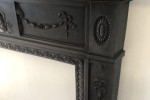 Cast iron fire surround