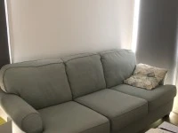 3 seats sofa, one seat sofa, a small dining table and four chairs that...