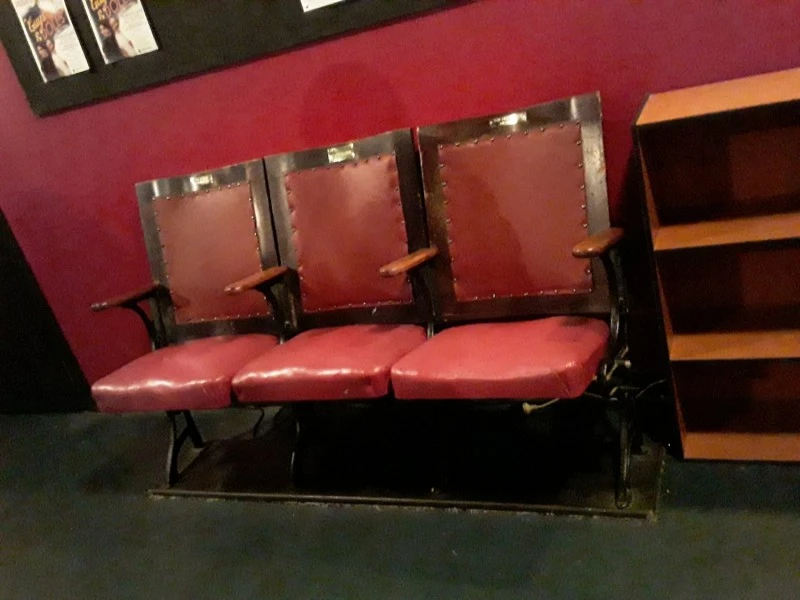 3 seat row of fixed theatre seats