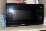 Console Table, TV, 2 boxes with glass items and crockery, Microwave, P...