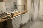 A group of kitchen cabinets stored in my garage to another property 3k...