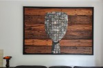 A piece of wall art 1.25H 1.8 W and narrow like a painting - weighs a...
