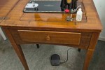 Sewing machine and table