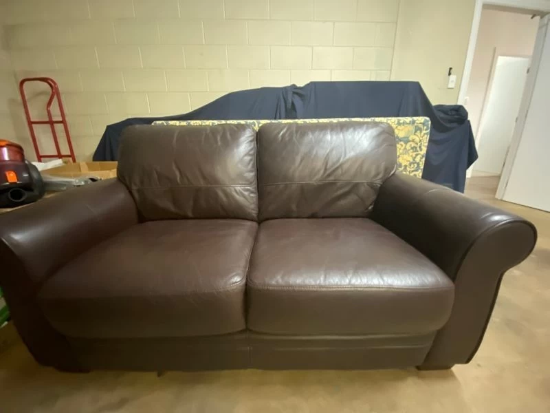 Near new 2 Seater Brown Leather Couch