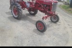 Small farmall cub tractor and implement