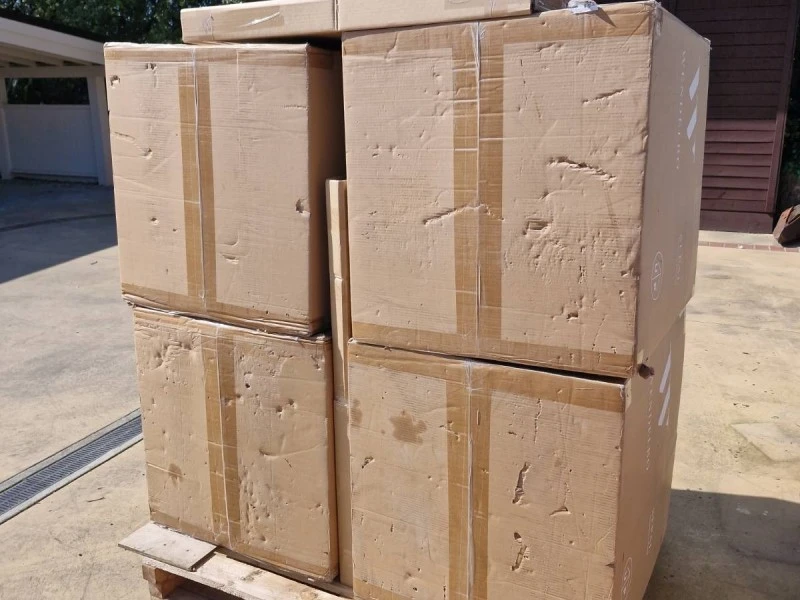 1 Pallet containing 4 boxed chairs, 2 boxed tables and 2 boxed paintin...