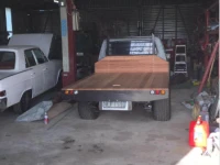 2x Toyota Hilux utes 1975 and 1x 1965 Rambler Classic.