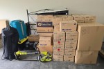 Lounge Chair + Poof, Single door fridge, Boxes of tools, Washer, Dryer
