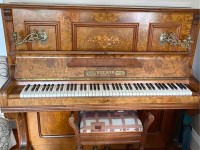 Very heavy upright piano, over 100 years old.