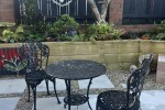Double bed, Dining table, Small outdoor table and two chairs