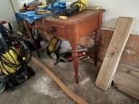 Battered small kauri table, Large wheeled suitcase