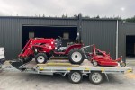 Sub compact tractor with mower