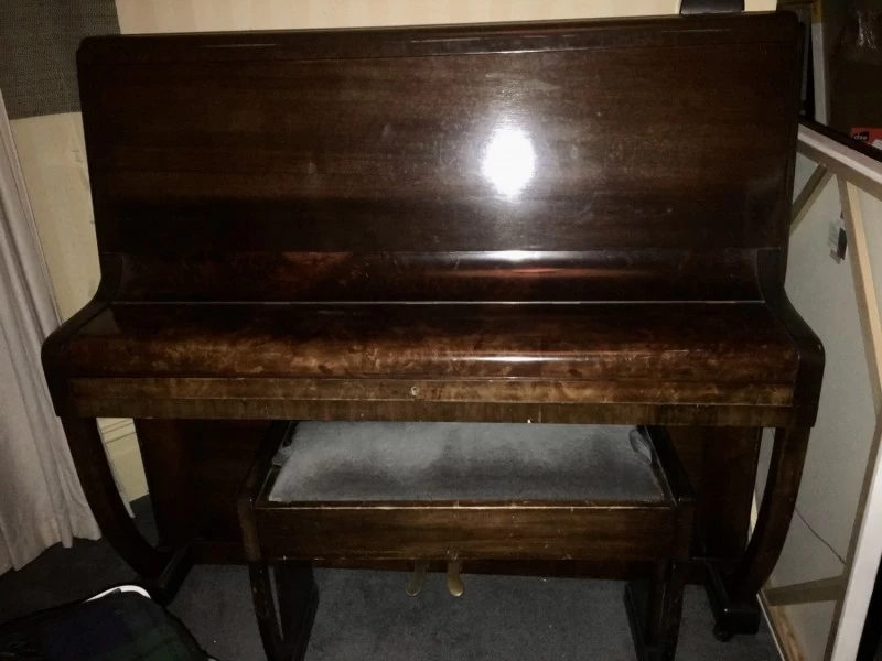Family piano. Old, but in good condition.