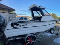 Motor boat Stabicraft 1850 on road trailer