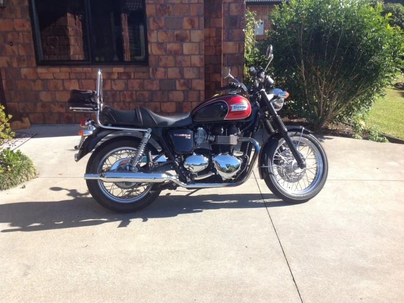 Motorcycle Triumph 2014 and Yamaha 1973 Bonneville and tx650