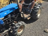 Iseki small tractor with trencher and grader