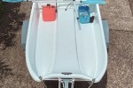 Small boat dinghy on trailer
