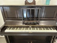 Wooden upright piano