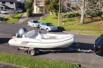 Rigid inflatable boat on trailer