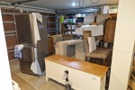 A garage full of furniture back into house
