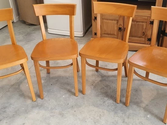 Four IKEA wooden dining chairs