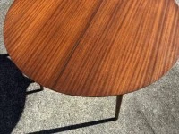 Round extendable dining table