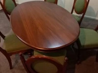 Oval NZ Kauri dining table and six chairs