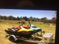 Other boat Two jet skis on a trailer